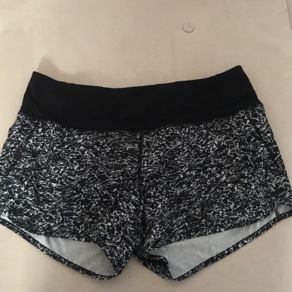 White and black lululemon running shorts